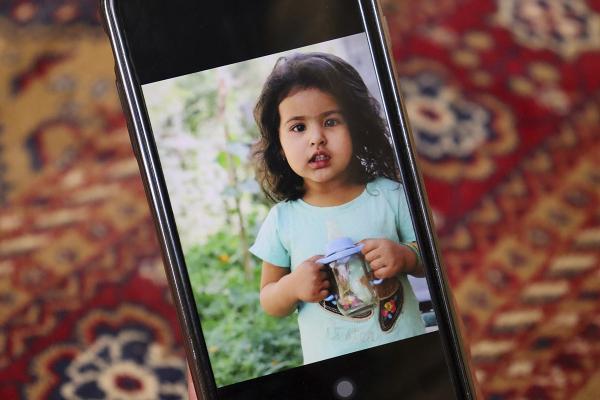 Picture on cell phone of young family member murdered in U.S. drone strike in Kabul.