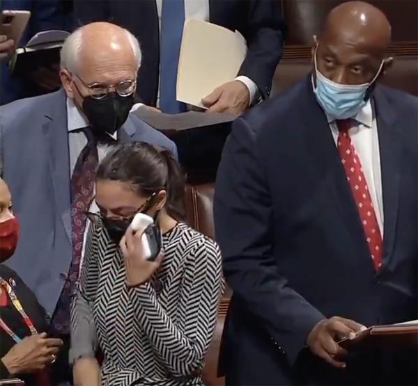 AOC wipes tears after she voted present to Israel Iron Dome funding bill.