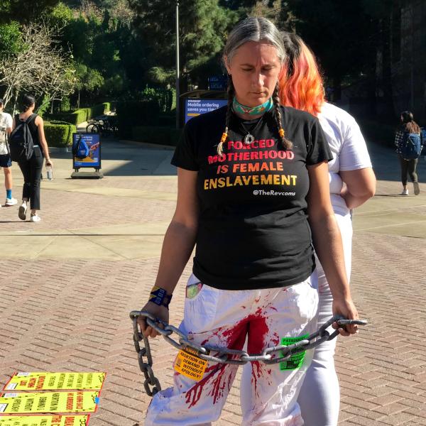 Women in bloody pants protest for abortion rights at UCLA.