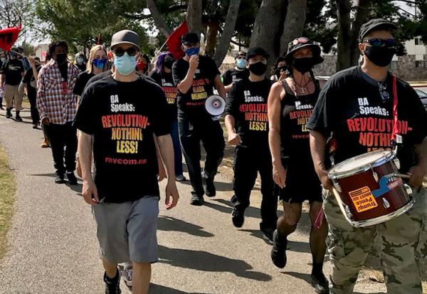 Los Angeles Revolution Club and others march on May 1, 2021.