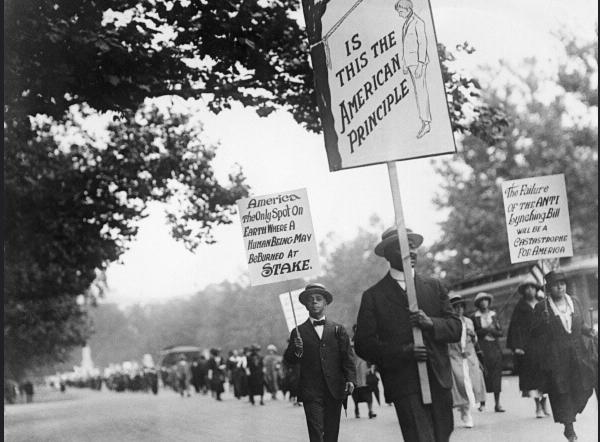 Thousands march in Washington, DC against lynching and for civil rights, 1922.