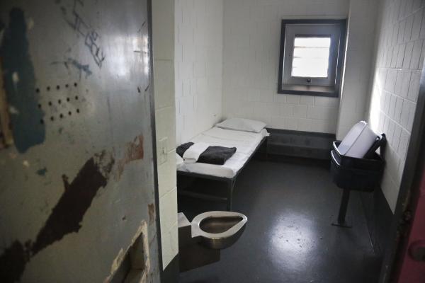 Rikers Island jail solitary cell with bed, latrine, sink