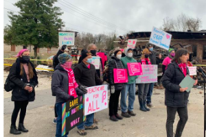 Rally by Planned Parenthood supporters outside the remains of the Knoxville clinic