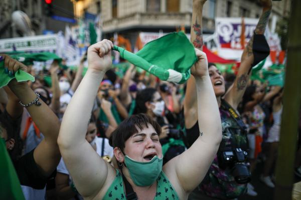 Women in Argentina protest while Congress debates legalizing abortion.