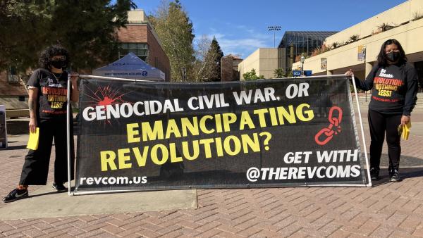 Los Angeles RevClub with No War banner.