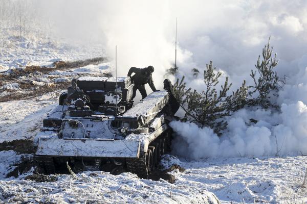 Russian troops drill in Belarus that borders Ukraine.