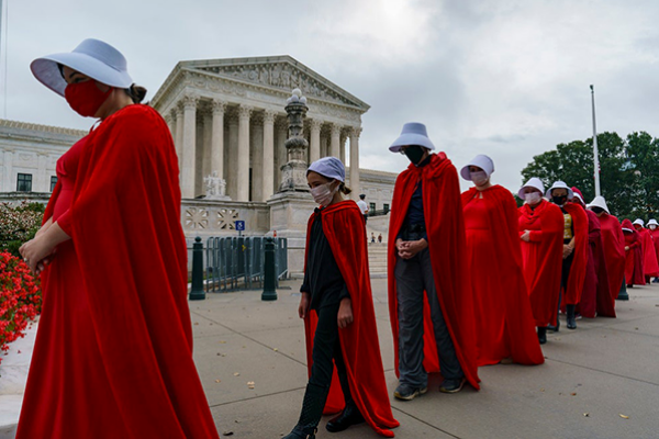 Protesters in Handmaids costumes outside the Supreme Court