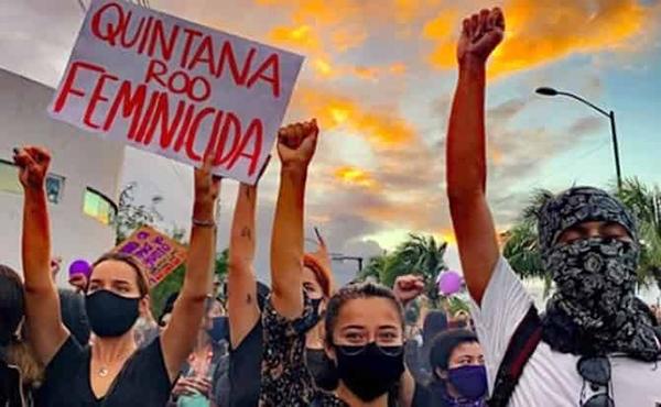 Women protest femicide in Cancun Mexico.