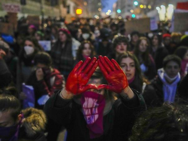 Demonstrators march to celebrate the International Women's Day in Rome, Tuesday, March 8, 2022.