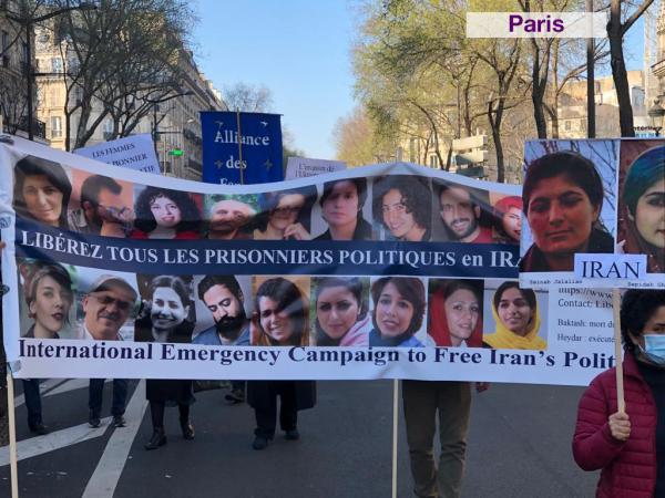 Paris International Women's Day Banner: Free All Political Prisoners In Iran Now