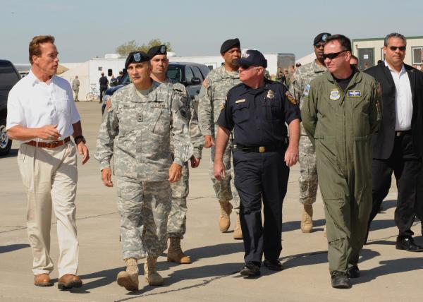 Arnold Schwarzenegger with military officials in Sacramento on July 4, 2008