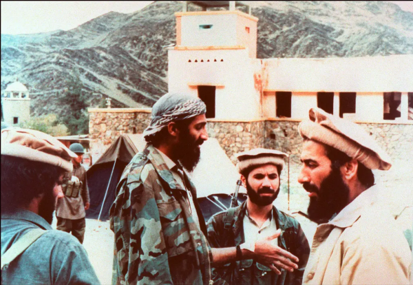 Osama bin Laden in 1989 with anti-Soviet fighters in Afghanistan
