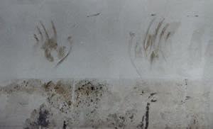 Wall of hand prints of victims inside shelter at Amiriyah, Iraq, bombed by U.S.