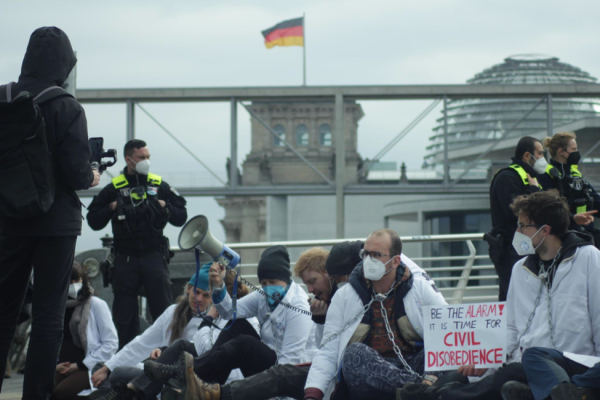 Scientists Rebellion activists in Berlin, Germany engaged in civil disobedience.