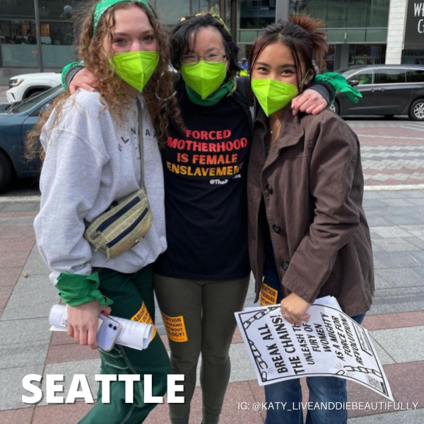 Three women at Seattle's RiseUp4AbortionRights rally in Seattle.