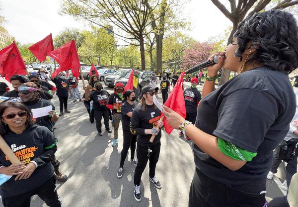 Michelle Xai speaking at May Day rally in New York City.