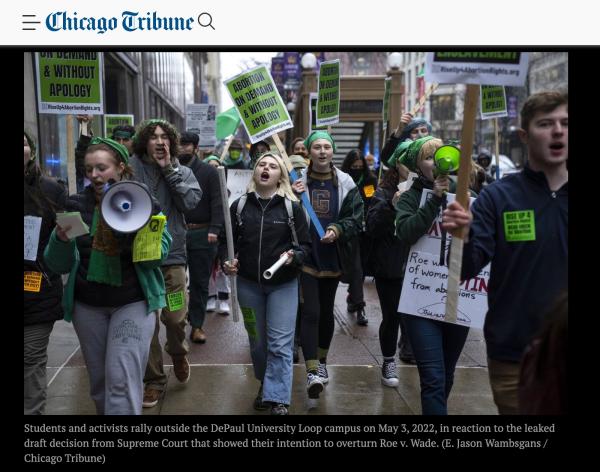 Chicago Tribune article with photos of RiseUp4AbortionRights signs.