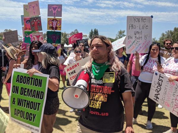 Santa Ana, California: Connor of the Revolution Club calling on people to Rise Up 4 Abortion Rights.