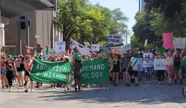 Austin, Texas, over a thousand students walk out for abortion rights.