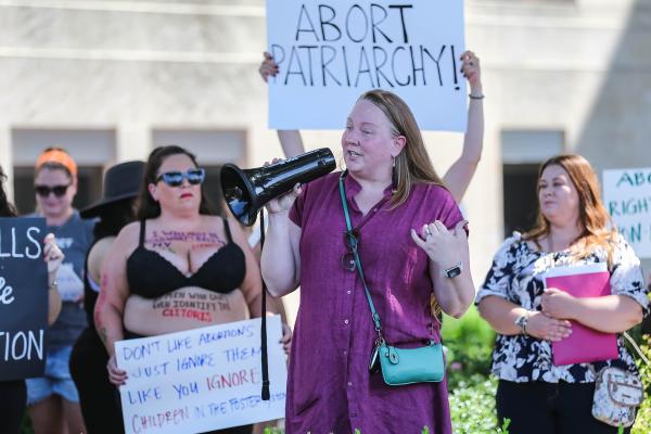 Norman, Oklahoma activists  protest SCOTUS overturn of Roe v Wade.