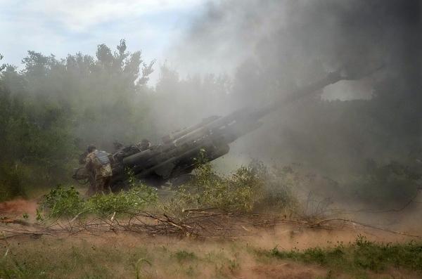 Ukrainian soldiers fire at Russians from U.S. supplied weapon.