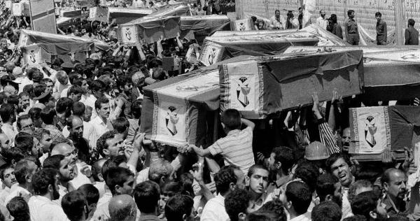 Iranians carrying coffins in the streets of Tehran of the victims of the U.S. airstrike against the Iranian commercial flight 655