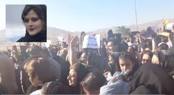 Women removed their headscarves to protest at the funeral of Mahsa Amini (inset) who died after being arrested by Iran's "morality police"