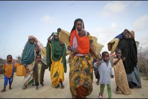 Somalian families flee drought stricken area, June 2022.