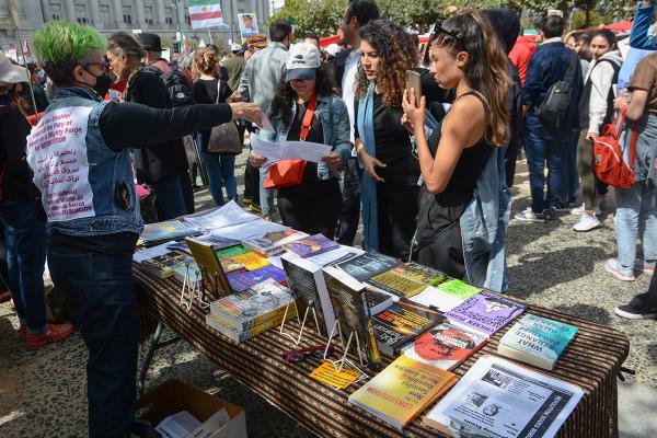 At Iran protest in San Francisco, Revolution Books has a literature table.