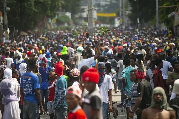 Haiti, massive protests demanding Henry resign.