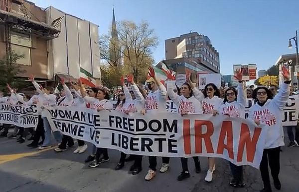 Montreal lead banner—Freedom for Iran—in march for Iran, October 22, 2022
