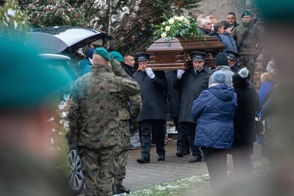 Polish carry casket of men killed by missile, November 12, 2022.