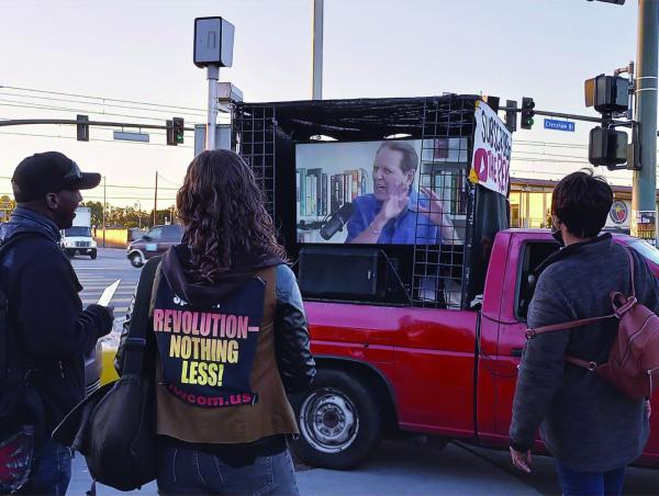 Out in South Central Los Angeles with a T.V in a truck showing people the NEW interview with Bob Avakian!