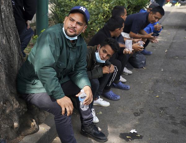 Migrants from Venezuela wait for help from Refuge Aid in Mexico City, October 20, 2022.