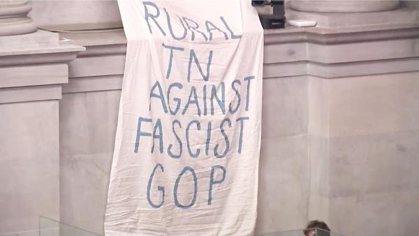 Banner hung in Nashville, Tennessee court reads, "Rural TN Against Fascist GOP."