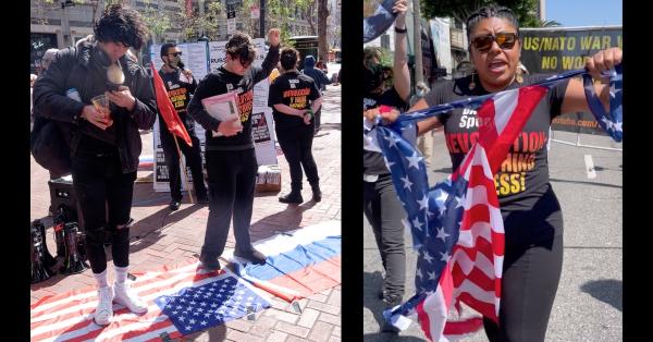 Standing on the American and Russian flags, and shredding the U.S. rag, at the April 2 protests.