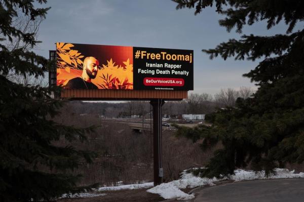 A digital billboard calling to free 33-year-old rapper Toomaj Salehi, along a road about 20 miles outside of Minneapolis, Minnesota.