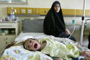 Child being treated for diarrhea in Baghdad, Iraq, 2004.