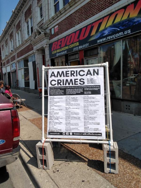 American Crimes poster display outside the Chicago Organizing Center