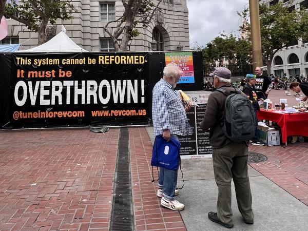 San Francisco Pride Fest banner "This system cannot be Reformed--It must be Overthrown!" 