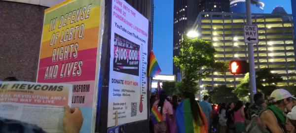 At Houston Pride Fest: "In defense of LGBTQ rights and lives" and livestream poster. 
