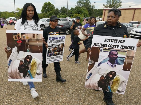 Protest of cop torture of Michael Jenkins and Eddie Parker, Mississippi.