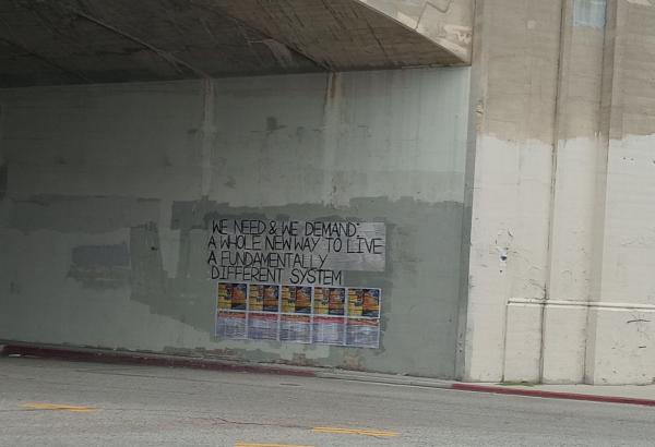 Mural appearing in the L.A. arts district on an underpass on saturation weekend
