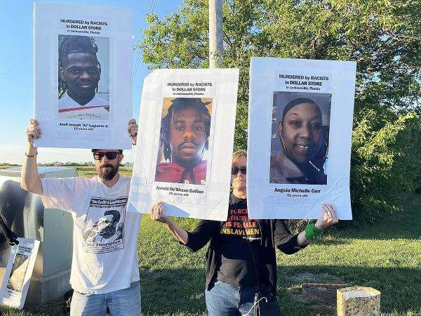 Chicago RevComs protest Aldean in Tinley Park, Illinois.