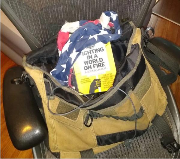 Paul Street's bag with ripped US flag.