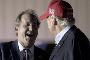 Ken Paxton grinning with Donald Trump