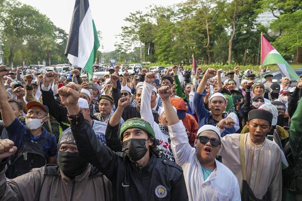 Jakarta, Indonesia, protesters shout slogans against Israeli airstrikes, October 11, 2023.