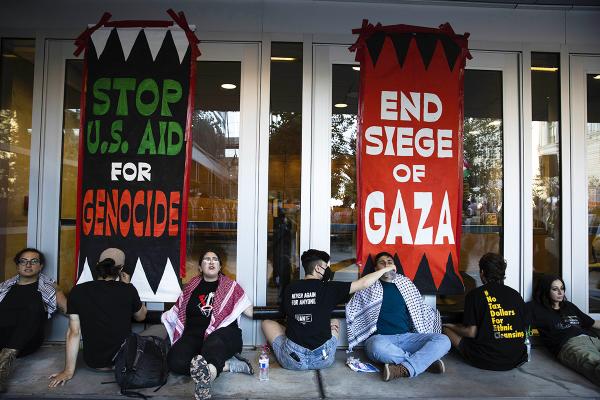Protesters chain themselves to doors of the San Francisco Federal Building during a protest in support of Palestinians, October 19, 2023.
