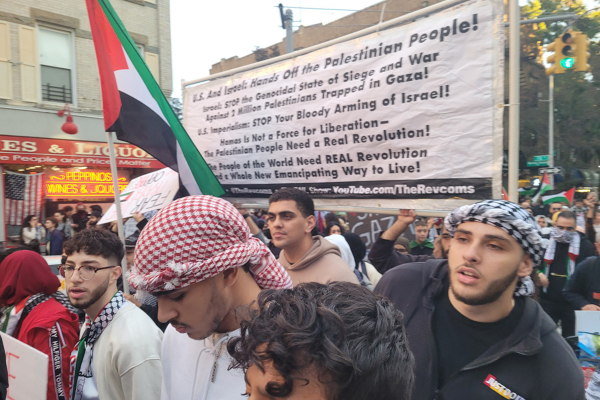 The NYC Revolution Club joined the march through the Bay Ridge section of Brooklyn, with a banner carried by fellow marchers.