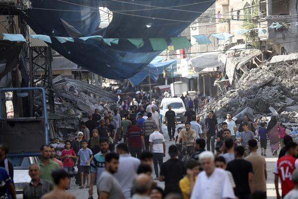 Palestinians seek food and supplies after Israeli airstrike on Jabaliya, November 1, 2023.
